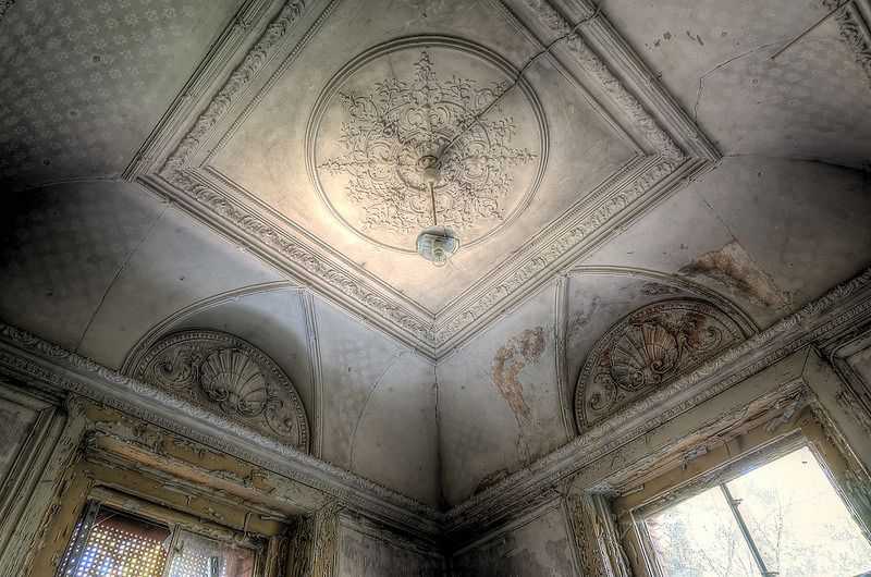 The haunting interior of an abandoned Neo-Renaissance mansion 2